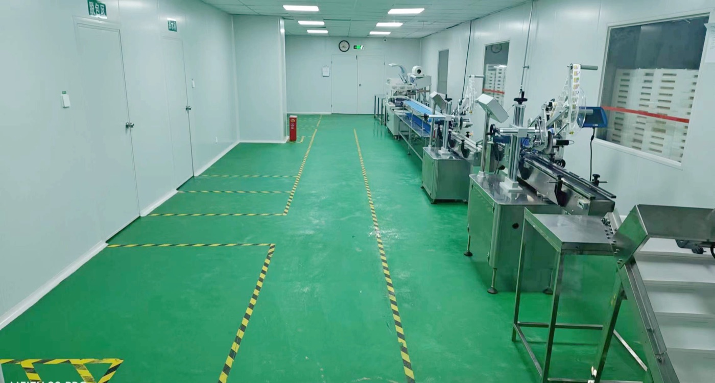 GMP cleanroom production hall with stainless steel packaging machines
